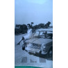 SEÑORA EN AUTOMÓVIL