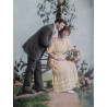 PAREJA EN UN BANCO DE JARDÍN. COLOREADA. AÑOS 30-40